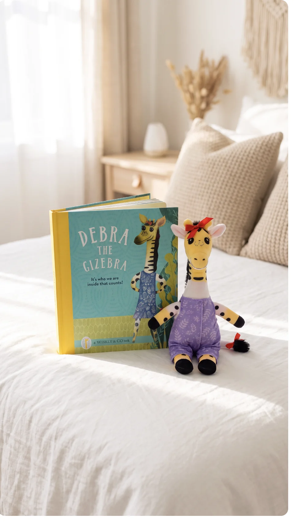Debra book and giraffe soft toy